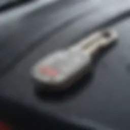 Close-up of a scratched car key highlighting the damage.
