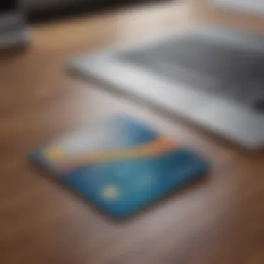 Business Credit Card for Startups A sleek business credit card on a desk with a laptop and financial documents.