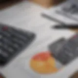 A calculator and financial documents representing mortgage calculations.