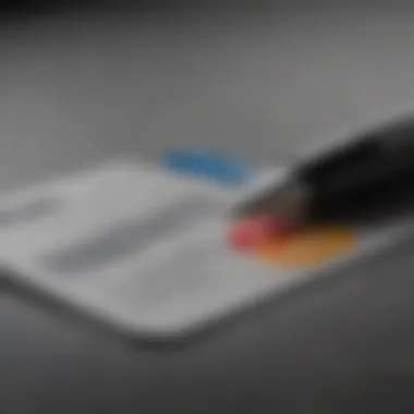 Close-up view of a credit card application form with a pen